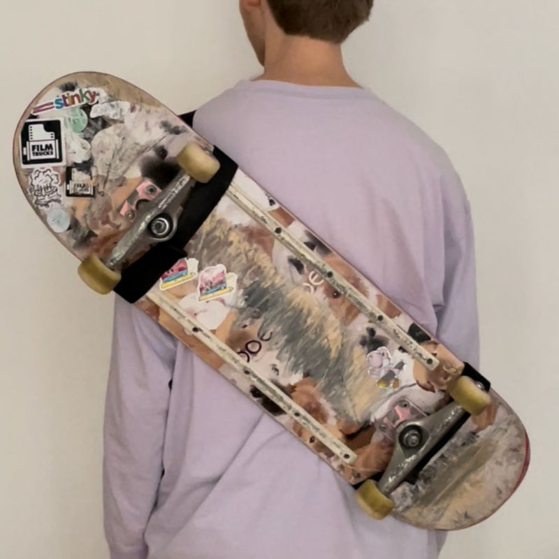 Skateboard carry fanny pack